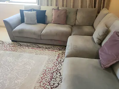 Light grey L-shaped fabric sofa - good condition