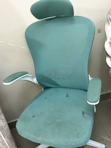Used ergonomic office chair with headrest and adjustable armrests - green and yellow