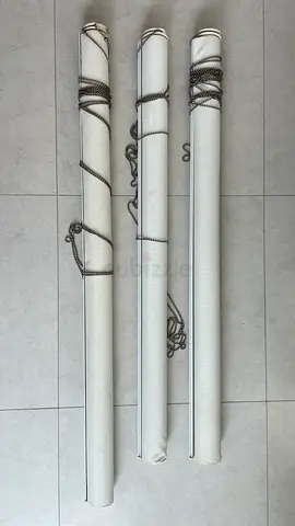 Three off-white fabric roller blinds with chains - used