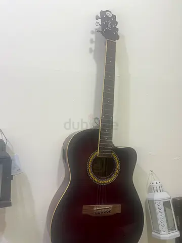 Used full-size acoustic guitar but one string broken