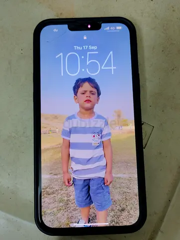 iPhone with protective black case — good working condition