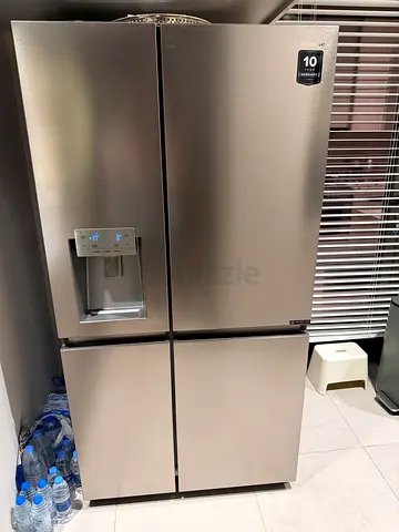 Hisense  4-Door Stainless Steel Refrigerator with Water Dispenser - Good Condition