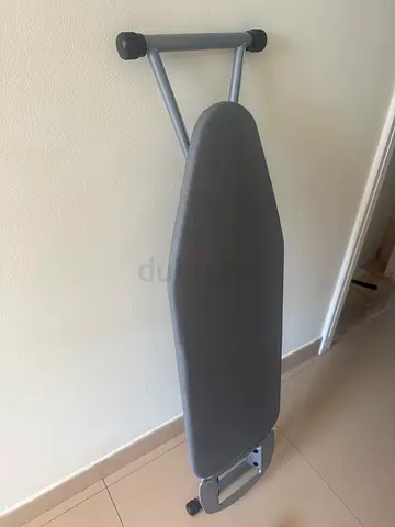 Portable ironing board with cover - good condition