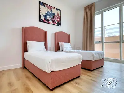 Pair of Single Beds with Upholstered Dusty Rose Frames with mattresses