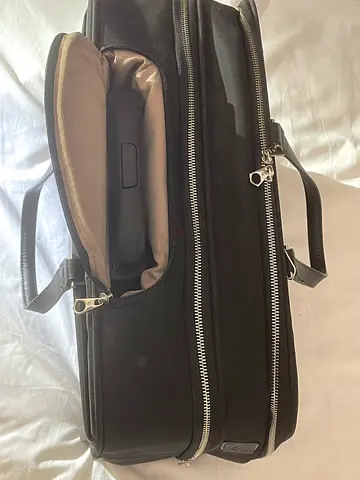 black Samsonite-style business/laptop travel bag in very good condition.