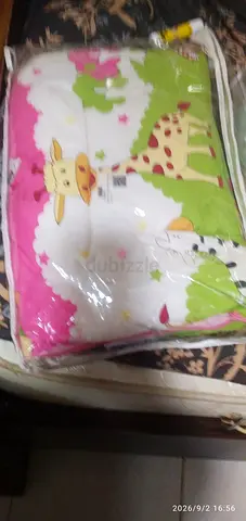 Pink baby sleeping nest / portable infant lounger