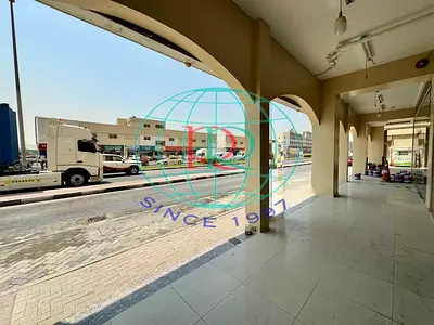 SINGLE DOOR SHOP WITH ATTACHED TOILET AVAILABLE FOR RENT ALONG THE MALEHA ROAD IN MUWAILEH AREA OPPOSITE OF DREAM ISLAND DISCOUNT CENTRE