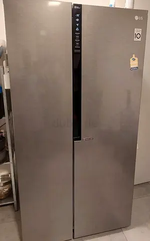 Lg Side-by-Side Refrigerator freezer- Good Condition