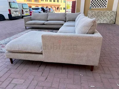 Like Perfect condition Pan Emirates U Shape sofa
