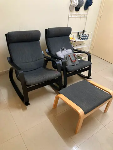 Pair of IKEA Poang armchairs with footstools - dark grey fabric, wooden frame