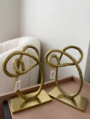 Home Box gold metal knot sculptures, set of 2, new with tags