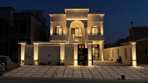 Villa for sale in Al Rawda 2 featuring a swimming pool; price includes electricity and water. Freehold ownership available for all nationalities.