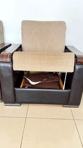 Triple brown leather armchair with storage compartment - good condition