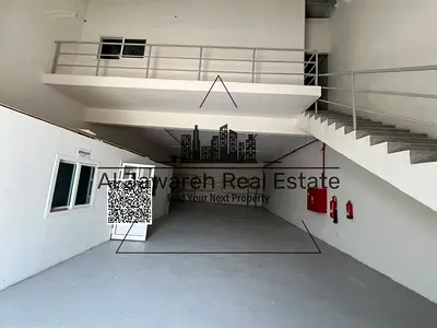 For annual rent: A distinctive warehouse with a mezzanine, suitable for all types of business activities, located in Ajman Industrial Area 1.