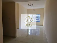 For sale in Emirates City: a one-bedroom apartment with a living room, 956 sq. ft., 7th floor, direc