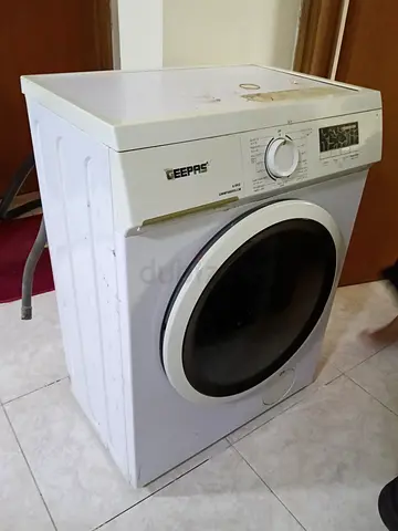 Used front-load washing machine — needs repair bit sound in dryer