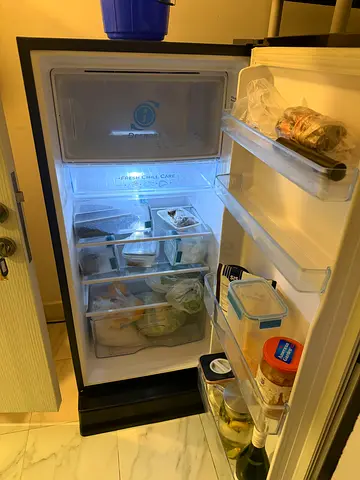 Used single-door refrigerator in good working condition. 122cm by 52cm. Perfect as 2nd fridge