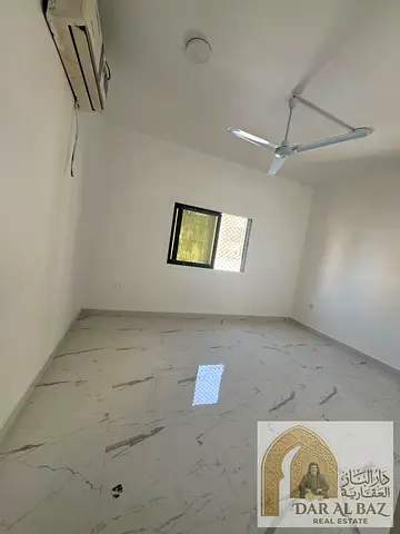 For Annual Rent in Al Majarah, Sharjah, a spacious studio apartment is available, suitable for bachelors or employees, and located close to Sharjah C