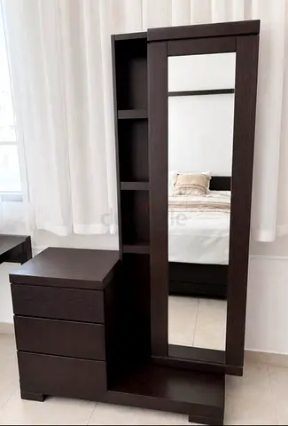Dark wood dresser with mirror and drawers - good condition