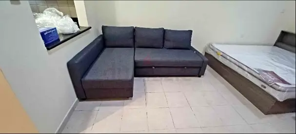 IKEA L shap Sofa store cum bed you can fix the storage lift or Right any side you want is available