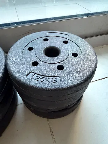 Set of Cast Iron Weight Plates (1.25 kg / 2.5 kg / 3 kg ) with a barbell - Good Condition