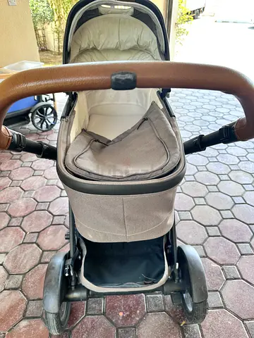 High-quality Pram Stroller NUNA with Brown Leather Handle