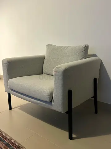 Light grey chair with black legs. Used only occasionally. 80cm square and 60cm high.