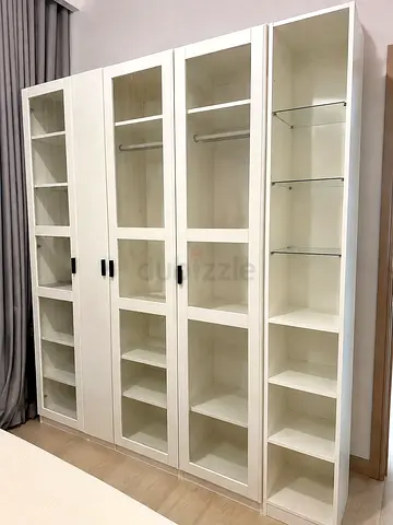 White 4‑Door Display Wardrobe with Glass Panels and Open Shelves