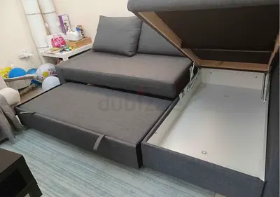 Grey L-Shaped Sofa Bed with Integrated Storage