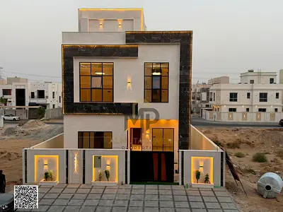 Luxury villa for sale in Al Yasmeen, Ajman | 6 master bedrooms, 3 living areas, two floors plus a rooftop level; elegant design and spacious interiors