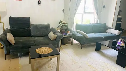 5 seater, 2 piece green tarpaulin sofa set with extendable backrest in good condition