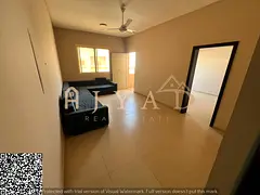 Annual rent in Ajman: 1BR with open-view balcony and central AC, in a vibrant location near all serv