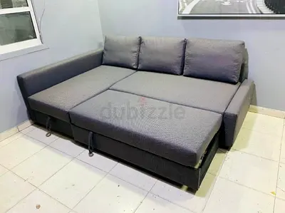 IKEA L shap Sofa store cum bed you can fix the storage lift or Right any side you want is available