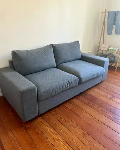 Comfortable 2-seater Grey Fabric Sofa bed— Good Condition