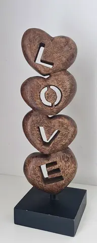 Figure/statue with the word love