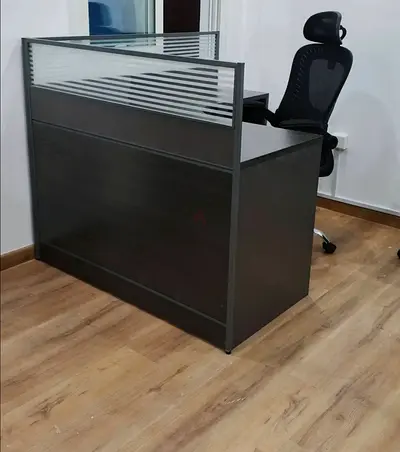 single office reception desk with privacy screen and ergonomic chair