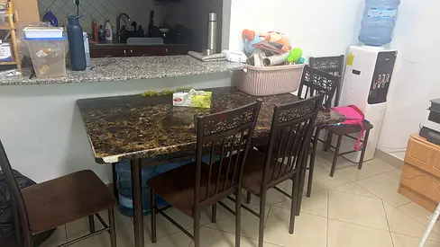 Marble-top dining table with 4 matching chairs - good condition