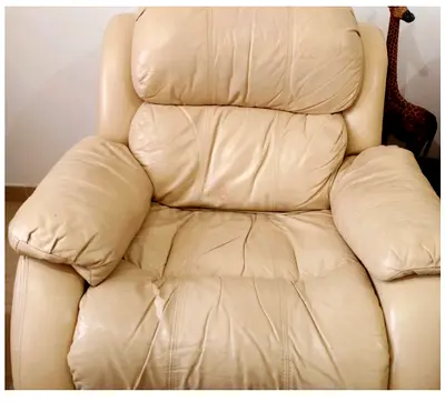 Beige Leather Recliner Armchair - Comfortable Used Condition