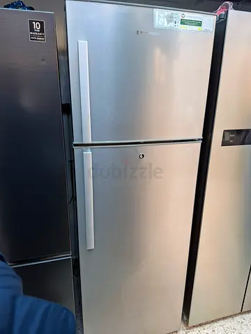 Stainless Steel Top-Freezer Refrigerator - Good Working Condition