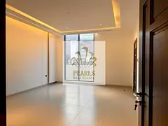 A move-in-ready villa is available for annual rent in Al Yasmeen, Ajman. It features 5 bedrooms, a m