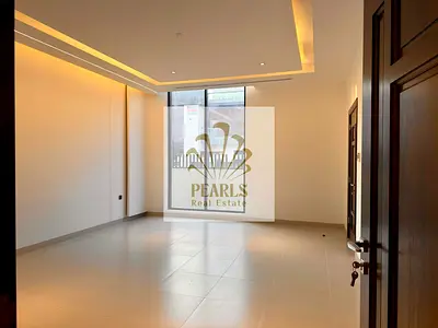A move-in-ready villa is available for annual rent in Al Yasmeen, Ajman. It features 5 bedrooms, a majlis, two living areas, and a maid's room, at a p