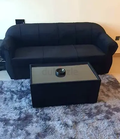 Black 3-seater sofa with coffee table and shaggy rug - good quality