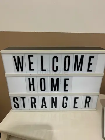 White lightbox sign with interchangeable letters