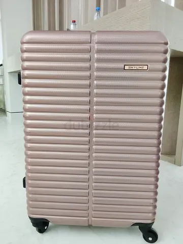 Skyline Hard Shell Roller Suitcase in Rose Gold 23” or 58cm