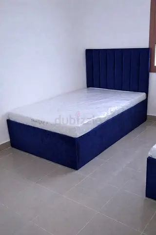 Double upholstered bed with mattress - navy blue, new