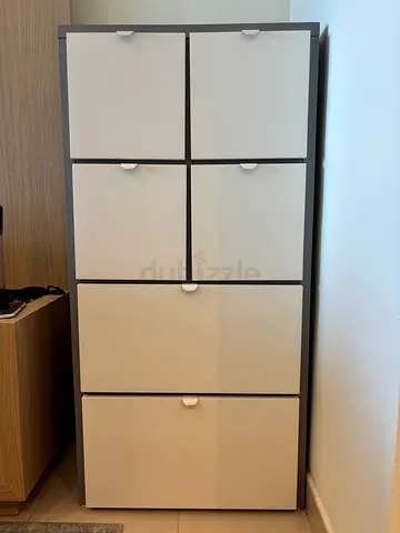 Compact white storage cabinet with 6 doors — perfect condition