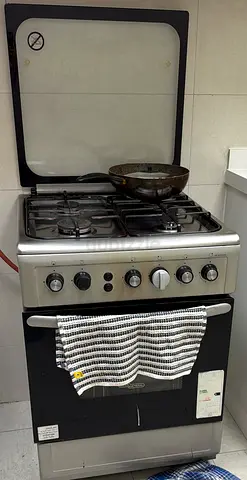 Used 4-Burner Gas Stove with Oven - Compact, Good Working Condition