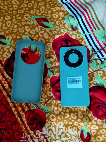 Honor x9d (green) with case, fresh condition phone, Remaining 2months warranty. 12gb Ram, 256gb.