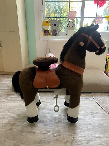 Plush Ride-On Horse Toy with Saddle and Reins - Good Condition
