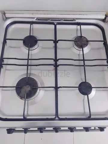 Used 4-Burner Gas Stove / Cooker - Functional, Needs Cleaning
